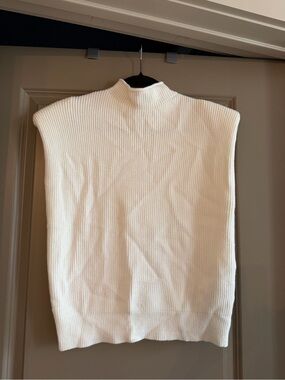 Cream Ribbed Knit Sleeveless Mock Neck Sweater Vest with shoulder pads